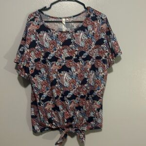 NY Collection Woman short sleeved blouse. Size 1X. Red, white, blue. Front tie.